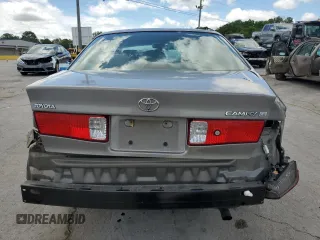 2000 Toyota Camry CE z VIN 4T1BG22KXYU639808, wystawiony jako Copart lot #56606985 z przebiegiem 119 678 mil mil oraz Szkoda całkowita • Salvage title. Historia ofert i sprzedaży dostępna na DreamBid. Obrazek 6.