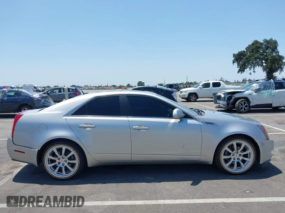 2008 Cadillac CTS RWD z VIN 1G6DV57V880153063, wystawiony jako IAAI lot #42440277 z przebiegiem 158 312 mil mil oraz . Historia ofert i sprzedaży dostępna na DreamBid. Obrazek 13.