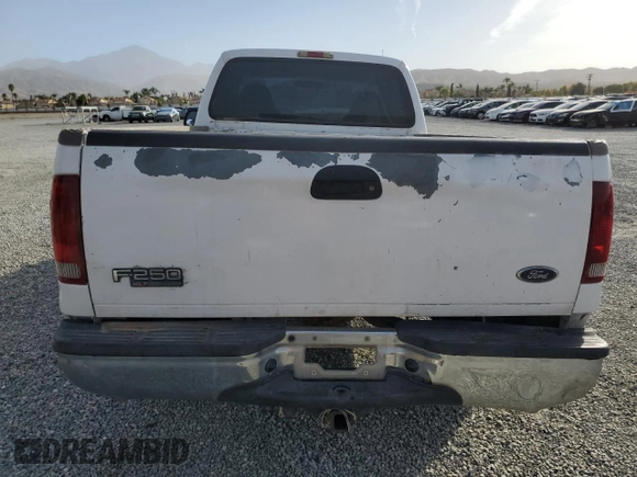 2002 Ford Super Duty F-250 XL with VIN 1FTNF20L52ED47162, listed as a Copart auction lot 79675304 with 216,687 mi miles and Salvage Title. Bid and sale history available at carsss.com. Image 6.