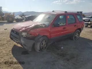 2001 Ford Escape XLS with VIN 1FMYU02161KE97828, listed as a Copart auction lot 62542154 with 186,810 mi miles and Salvage Title. Bid and sale history available at carsss.com. Image 1.