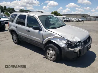 2007 Ford Escape XLS z VIN 1FMYU02Z97KC06172, wystawiony jako Copart lot #56978575 z przebiegiem 155 456 mil mil oraz Szkoda całkowita • Salvage title. Historia ofert i sprzedaży dostępna na DreamBid. Obrazek 4.
