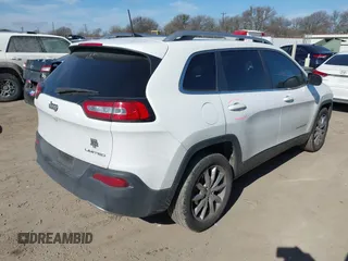 2016 Jeep Cherokee Limited with VIN 1C4PJLDB8GW256788, listed as a IAAI auction lot 41657339 with 104,630 mi miles. Bid and sale history available at carsss.com. Image 4.