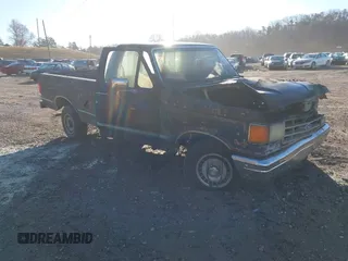 1987 Ford F-150 with VIN 1FTDF15Y0HNA83870, listed as a IAAI auction lot 41659853 with 1 mi miles. Bid and sale history available at carsss.com. Image 1.