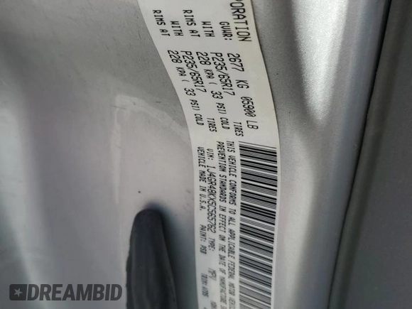 2005 Jeep Grand Cherokee Laredo with VIN 1J4GR48KX5C565762, listed as a Copart auction lot 63080115 with 122,349 mi miles and Salvage title. Bid and sale history available at DreamBid. Image 13.