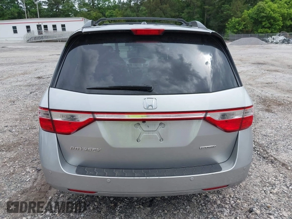 2012 Honda Odyssey Touring с VIN 5FNRL5H90CB083157, выставлен на аукционе IAAI как лот 42176609 с пробегом 250 000 миль миль и . История ставок и продаж доступна на DreamBid. Изображение 16.