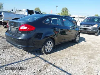 2011 Ford Fiesta SE with VIN 3FADP4BJ4BM144991, listed as a IAAI auction lot 42202406 with 67,448 mi miles and . Bid and sale history available at carsss.com. Image 4.
