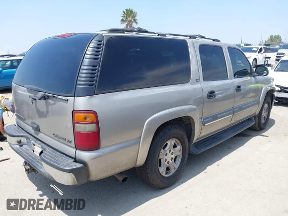 2002 Chevrolet Suburban LT z VIN 1GNFK16T92J208121, wystawiony jako IAAI lot #42163490 z przebiegiem 177 145 mil mil oraz . Historia ofert i sprzedaży dostępna na DreamBid. Obrazek 4.