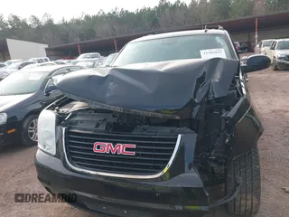 2012 GMC Yukon SLT with VIN 1GKS1CE06CR104447, listed as a IAAI auction lot 41589823 with 183,003 mi miles. Bid and sale history available at carsss.com. Image 12.