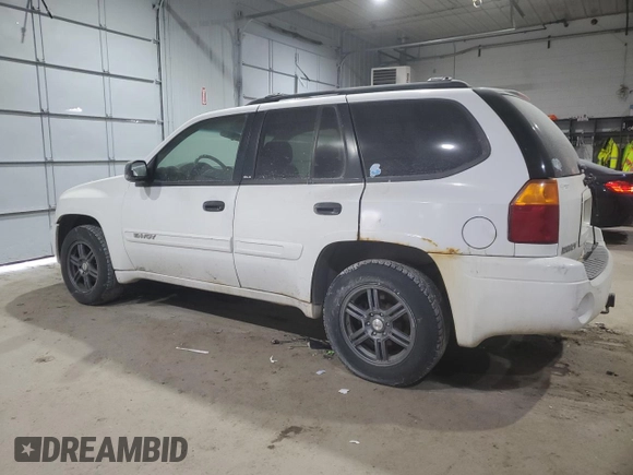 2003 GMC Envoy SLE z VIN 1GKDT13S632156357, wystawiony jako Copart lot #41398035 z przebiegiem 160 338 mil mil oraz Szkoda całkowita • Salvage title. Historia ofert i sprzedaży dostępna na DreamBid. Obrazek 2.