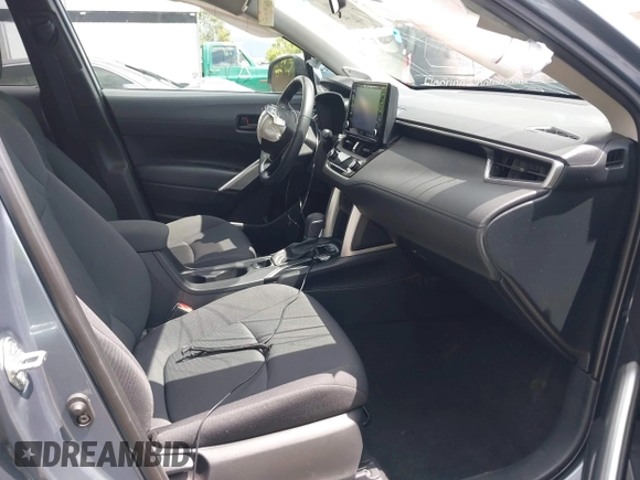 2022 Toyota Corolla Cross LE with VIN 7MUBAAAG1NV004852, listed as a IAAI auction lot 42251301 with 50,197 mi miles and . Bid and sale history available at DreamBid. Image 5.