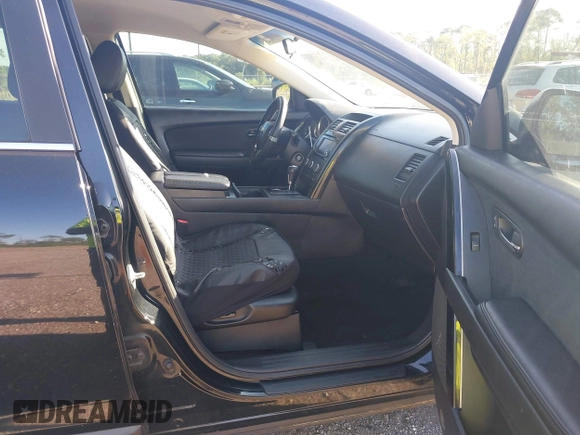 2014 Mazda CX-9 Touring with VIN JM3TB2CA1E0434126, listed as a IAAI auction lot 42639539 with 116,247 mi miles and . Bid and sale history available at DreamBid. Image 5.