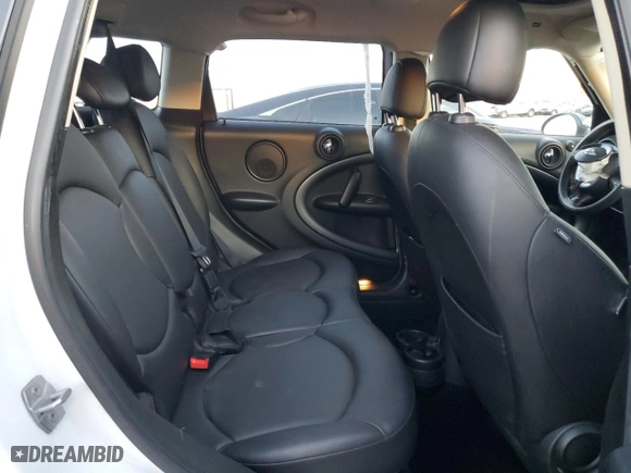 2014 MINI Cooper Countryman S with VIN WMWZC3C56EWP25014, listed as a Copart auction lot 88440985 with 95,058 mi miles and Salvage Title. Bid and sale history available at carsss.com. Image 10.