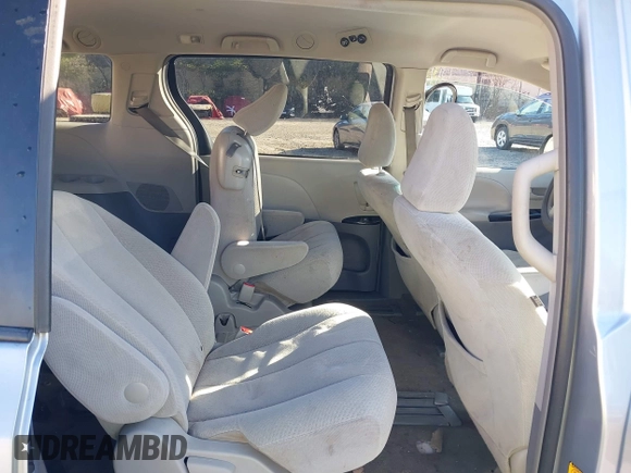 2012 Toyota Sienna with VIN 5TDKA3DC7CS015592, listed as a IAAI auction lot 40839775 with 161,944 mi miles and . Bid and sale history available at DreamBid. Image 8.