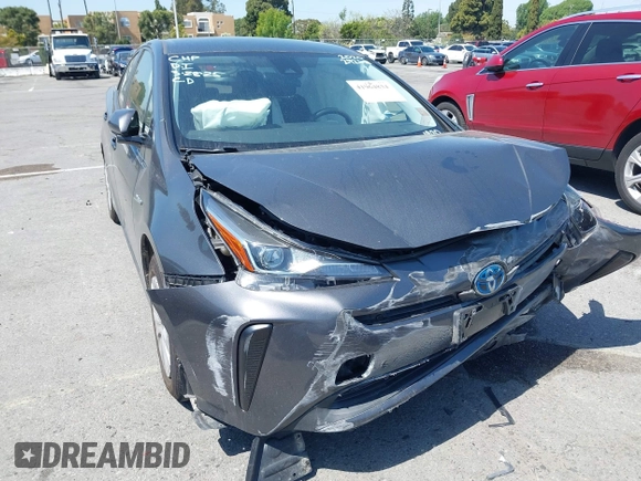 2020 Toyota Prius L Eco z VIN JTDKARFU3L3111990, wystawiony jako IAAI lot #41964834 z przebiegiem 67 873 mil mil oraz . Historia ofert i sprzedaży dostępna na DreamBid. Obrazek 1.