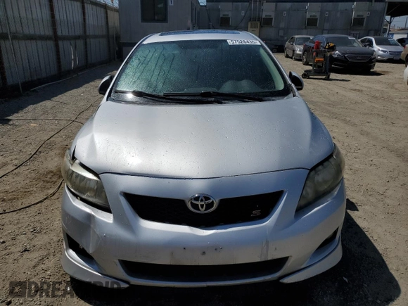 2010 Toyota Corolla with VIN 2T1BU4EE8AC427717, listed as a Copart auction lot 57528435 with 142,826 mi miles and Salvage title. Bid and sale history available at DreamBid. Image 5.