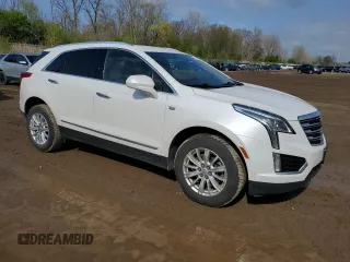 2017 Cadillac XT5 FWD with VIN 1GYKNARS0HZ157551, listed as a Copart auction lot 55281725 with 144,077 mi miles and Clean title. Bid and sale history available at DreamBid. Image 4.