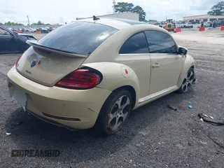 2019 Volkswagen Beetle S with VIN 3VWFD7AT2KM700941, listed as a IAAI auction lot 42474867 with 43,891 mi miles and . Bid and sale history available at DreamBid. Image 4.