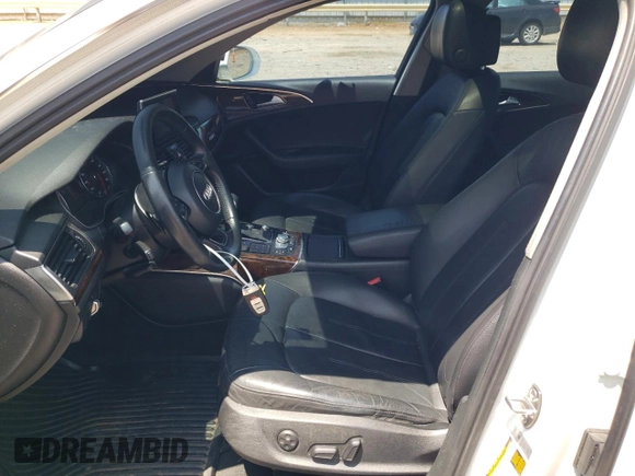 2015 Audi A6 Premium Plus with VIN WAUGFAFC2FN037063, listed as a Copart auction lot 58071405 with 150,007 mi miles and Salvage title. Bid and sale history available at DreamBid. Image 7.