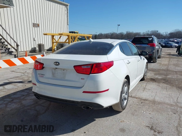 2014 Kia Optima LX with VIN 5XXGM4A73EG322983, listed as a IAAI auction lot 41708101 with 84,334 mi miles. Bid and sale history available at carsss.com. Image 4.
