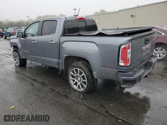 2022 GMC Canyon 4WD Denali with VIN 1GTG6EEN0N1147922, listed as a Copart auction lot 54143435 with 68,650 mi miles and Salvage title. Bid and sale history available at DreamBid. Image 2.