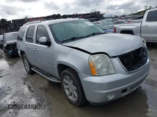 2012 GMC Yukon Denali with VIN 1GKS1EEF0CR256515, listed as a IAAI auction lot 41079993 with 207,470 mi miles. Bid and sale history available at carsss.com. Image 1.