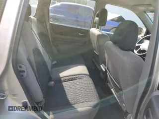 2006 Nissan X-Trail XE z VIN JN8BT08T06W100432, wystawiony jako Copart lot #70907374 z przebiegiem 263 759 mil mil oraz Szkody całkowita. Historia ofert i sprzedaży dostępna na DreamBid. Obrazek 11.