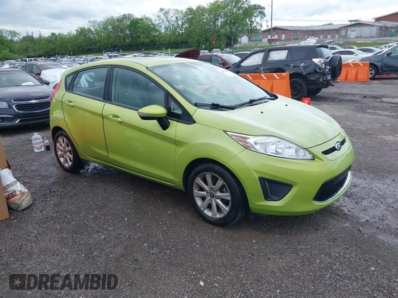 2013 Ford Fiesta SE with VIN 3FADP4EJ7DM136723, listed as a IAAI auction lot 42090284 with 168,004 mi miles and . Bid and sale history available at DreamBid. Image 1.