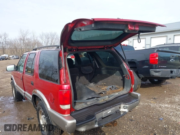 2000 Chevrolet Blazer LT z VIN 1GNDT13W2Y2163805, wystawiony jako IAAI lot #41537780 z przebiegiem 170 527 mil mil oraz . Historia ofert i sprzedaży dostępna na DreamBid. Obrazek 3.