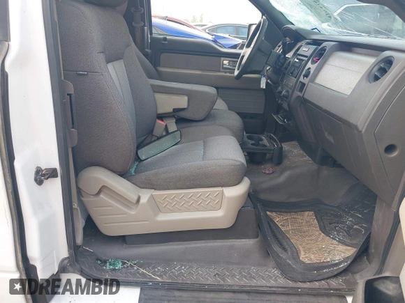 2009 Ford F-150 STX with VIN 1FTRX12W59KA47374, listed as a IAAI auction lot 41944557 with 194,066 mi miles and . Bid and sale history available at DreamBid. Image 5.
