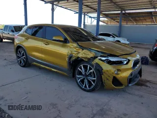 2018 BMW X2 sDrive28i with VIN WBXYJ3C39JEJ91397, listed as a Copart auction lot 62168425 with 72,594 mi miles and Salvage title. Bid and sale history available at DreamBid. Image 4.