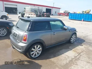 2009 MINI Hardtop S with VIN WMWMF73509TW86792, listed as a IAAI auction lot 41766406 with 174,724 mi miles and . Bid and sale history available at DreamBid. Image 4.