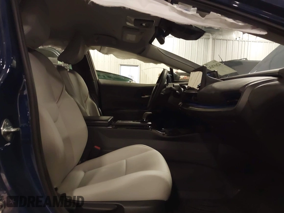 2024 Toyota Prius LE with VIN JTDACAAU1R3045821, listed as a IAAI auction lot 42657634 with 3,574 mi miles and . Bid and sale history available at DreamBid. Image 5.