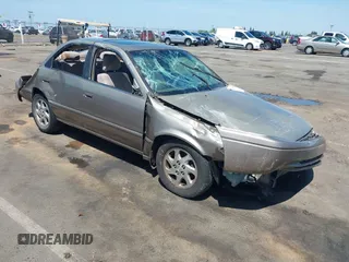 1999 Toyota Camry LE z VIN JT2BF28K9X0216523, wystawiony jako IAAI lot #42143173 z przebiegiem 190 108 mil mil oraz . Historia ofert i sprzedaży dostępna na DreamBid. Obrazek 1.