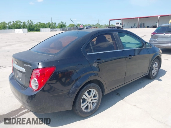 2015 Chevrolet Sonic LT with VIN 1G1JC5SH7F4160978, listed as a IAAI auction lot 42229099 with 211,664 mi miles and . Bid and sale history available at DreamBid. Image 4.