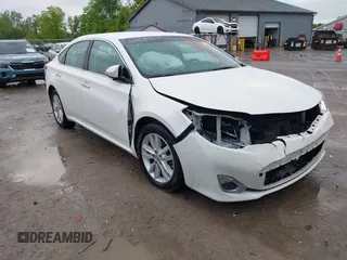 2014 Toyota Avalon Limited z VIN 4T1BK1EB8EU130736, wystawiony jako IAAI lot #42268784 z przebiegiem 122 285 mil mil oraz . Historia ofert i sprzedaży dostępna na DreamBid. Obrazek 1.