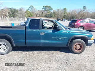 1997 Dodge Dakota z VIN 1B7GL23X0VS287930, wystawiony jako IAAI lot #41331844 z przebiegiem 144 739 mil mil oraz . Historia ofert i sprzedaży dostępna na DreamBid. Obrazek 13.