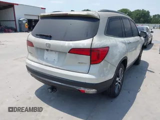 2017 Honda Pilot Touring z VIN 5FNYF6H93HB007898, wystawiony jako IAAI lot #42289193 z przebiegiem 70 498 mil mil oraz . Historia ofert i sprzedaży dostępna na DreamBid. Obrazek 4.
