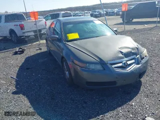 2006 Acura TL with VIN 19UUA66216A018795, listed as a IAAI auction lot 41934489 with 254,590 mi miles. Bid and sale history available at carsss.com. Image 1.