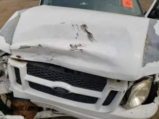 2005 Ford Explorer Sport Trac XLS with VIN 1FMZU77K75UB56611, listed as a Copart auction lot 60622925 with 157,063 mi miles and Salvage title. Bid and sale history available at DreamBid. Image 11.