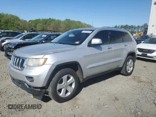 2011 Jeep Grand Cherokee Laredo with VIN 1J4RR4GG1BC714058, listed as a Copart auction lot 54974435 with 201,329 mi miles and Clean Title. Bid and sale history available at carsss.com. Image 1.