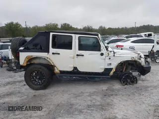 2014 Jeep Wrangler Unlimited Sahara with VIN 1C4BJWEG0EL151473, listed as a IAAI auction lot 41600726 with 119,057 mi miles. Bid and sale history available at carsss.com. Image 13.