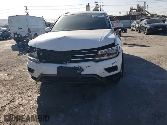2020 Volkswagen Tiguan SE z VIN 3VV3B7AX6LM107732, wystawiony jako Copart lot #52038695 z przebiegiem 27 317 mil mil oraz Szkoda całkowita • Salvage title. Historia ofert i sprzedaży dostępna na DreamBid. Obrazek 11.