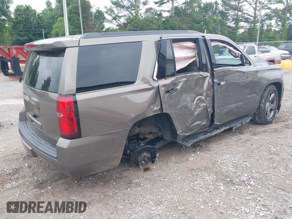 2016 Chevrolet Tahoe LT z VIN 1GNSCBKC2GR420861, wystawiony jako IAAI lot #42205983 z przebiegiem 149 680 mil mil oraz . Historia ofert i sprzedaży dostępna na DreamBid. Obrazek 4.