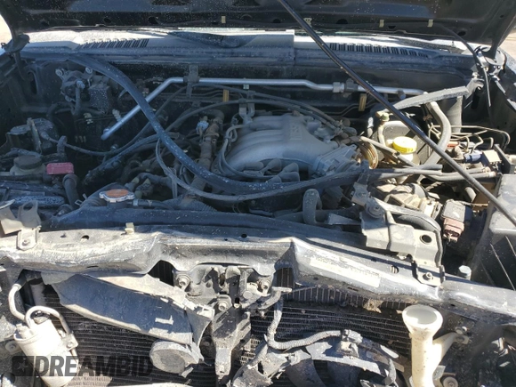 2001 Nissan Xterra XE with VIN 5N1ED28T01C522269, listed as a Copart auction lot 56997515 with 103,800 mi miles and Salvage title. Bid and sale history available at DreamBid. Image 12.