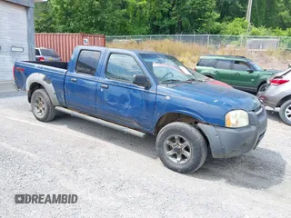 2002 Nissan Frontier XE z VIN 1N6ED29Y22C362795, wystawiony jako IAAI lot #42432950 z przebiegiem 180 270 mil mil oraz . Historia ofert i sprzedaży dostępna na DreamBid. Obrazek 1.