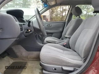 2000 Toyota Camry CE z VIN 4T1BG22K3YU649970, wystawiony jako Copart lot #55654425 z przebiegiem 220 076 mil mil oraz Szkoda całkowita • Salvage title. Historia ofert i sprzedaży dostępna na DreamBid. Obrazek 7.