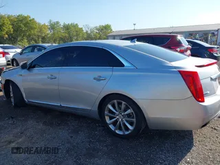 2013 Cadillac XTS Premium z VIN 2G61S5S30D9184910, wystawiony jako IAAI lot #40220419 z przebiegiem 111 330 mil mil oraz . Historia ofert i sprzedaży dostępna na DreamBid. Obrazek 14.