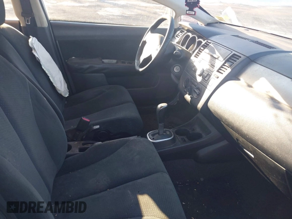 2011 Nissan Versa S with VIN 3N1BC1AP5BL423246, listed as a IAAI auction lot 41329258 with Not provided miles and . Bid and sale history available at DreamBid. Image 5.