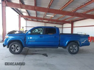 2017 Toyota Tacoma SR5 with VIN 3TMBZ5DN1HM009204, listed as a IAAI auction lot 41301765 with 129,923 mi miles and . Bid and sale history available at DreamBid. Image 14.