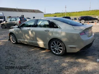 2015 Lincoln MKZ z VIN 3LN6L2JK4FR629312, wystawiony jako Copart lot #60230405 z przebiegiem 79 570 mil mil oraz Szkoda całkowita • Salvage title. Historia ofert i sprzedaży dostępna na DreamBid. Obrazek 2.